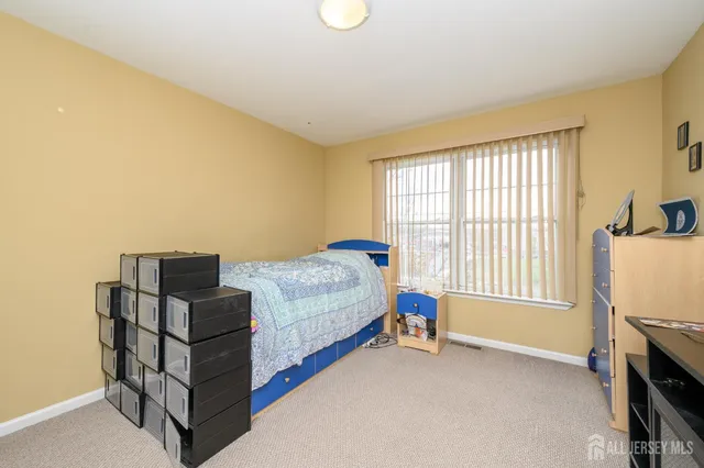 a view of balcony with wooden floor and fence