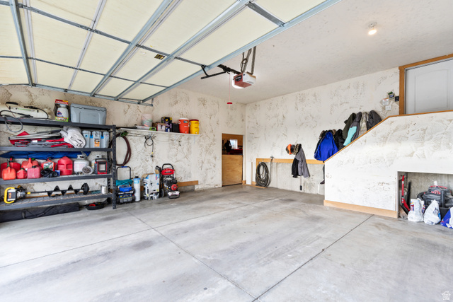 580 Cherry Ridge Lane Richmond, UT 84333 - Photo 47 of 53 Garage featuring a garage door opener