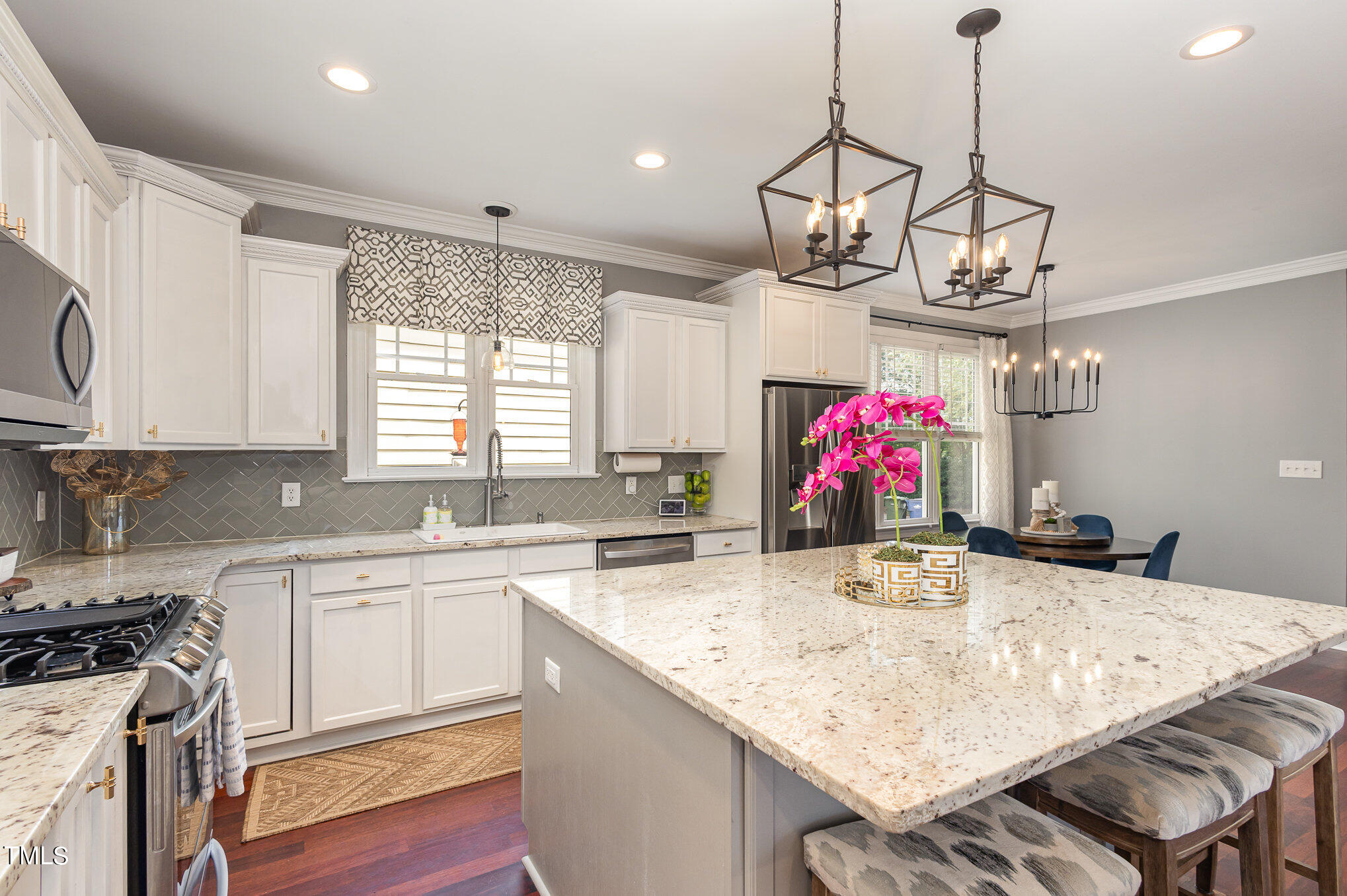 10534 Evergreen Spring Place Raleigh, NC 27614 - Photo 11 of 30 a kitchen with sink and microwave