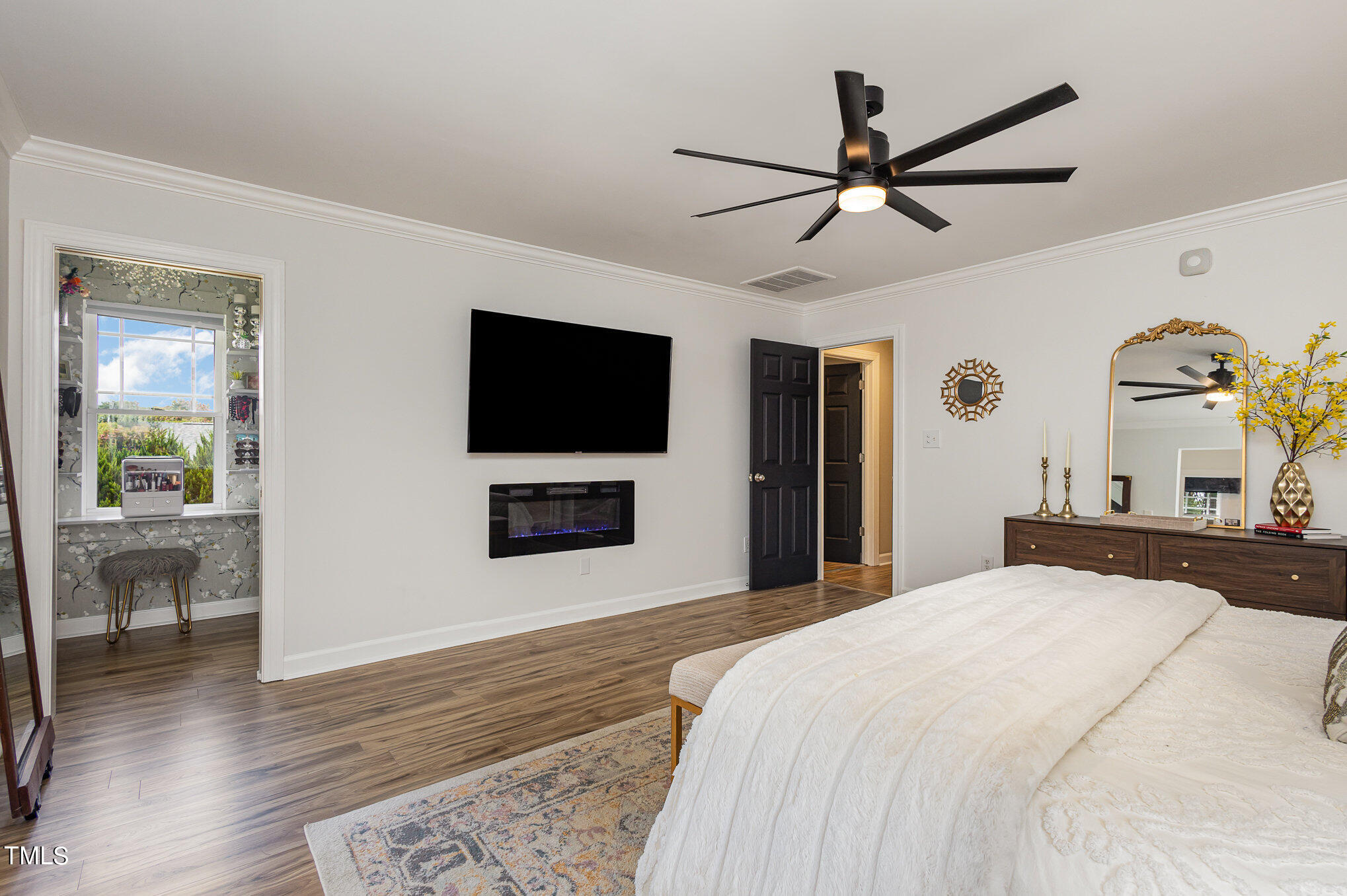 10534 Evergreen Spring Place Raleigh, NC 27614 - Photo 15 of 30 a bedroom with a bed and a flat screen tv
