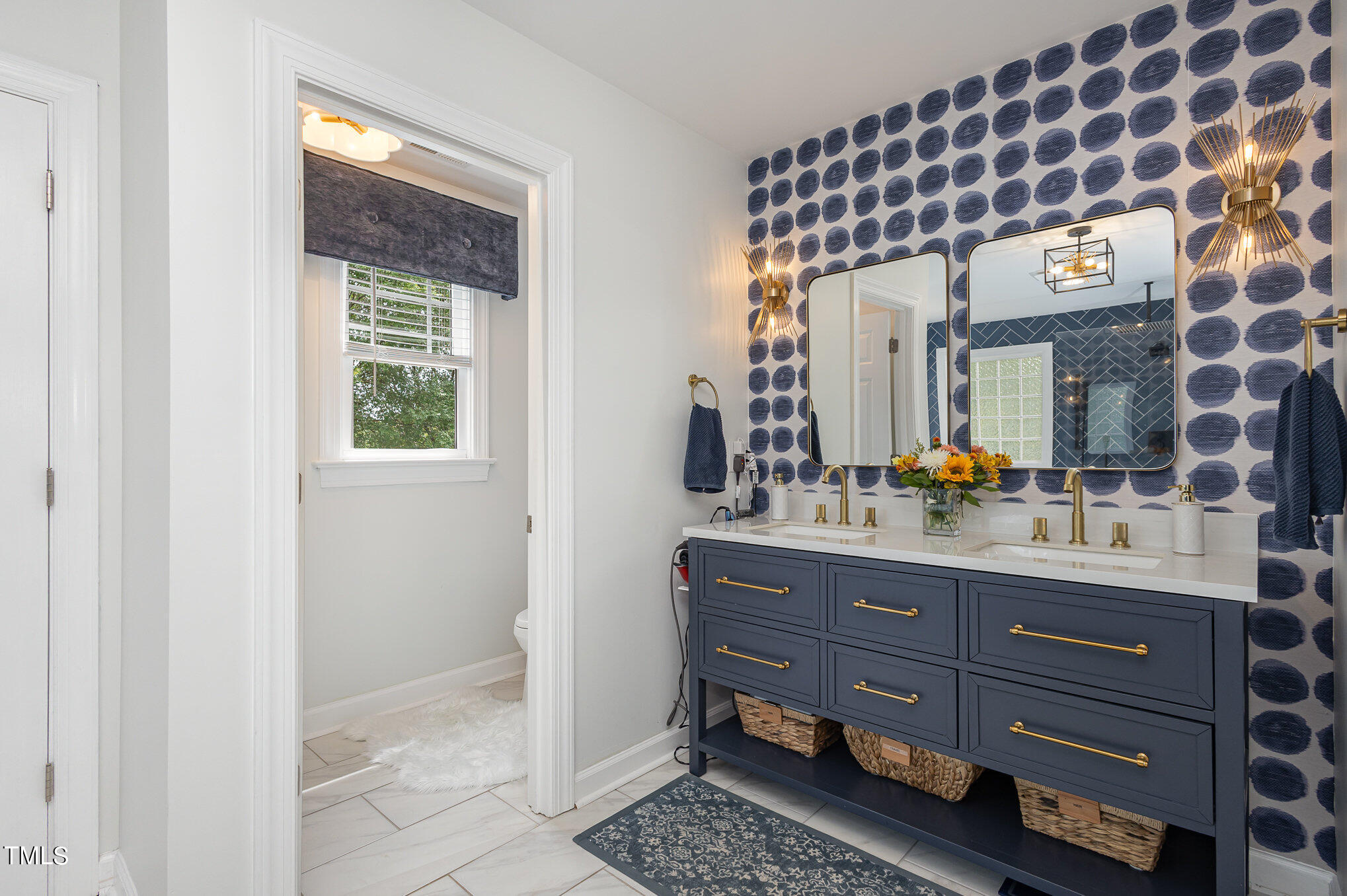 10534 Evergreen Spring Place Raleigh, NC 27614 - Photo 17 of 30 a bathroom with a double vanity sink mirror and