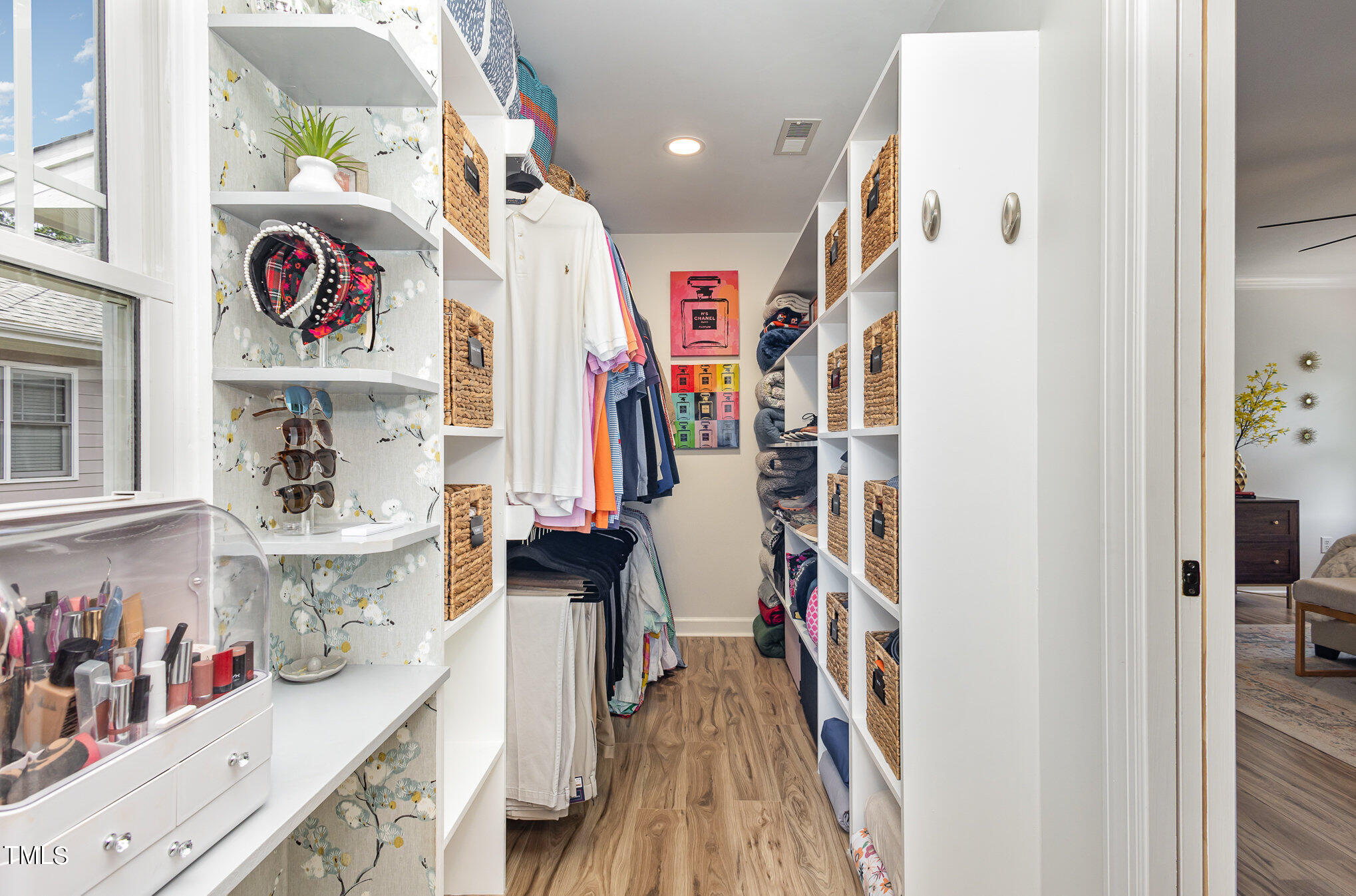 10534 Evergreen Spring Place Raleigh, NC 27614 - Photo 18 of 30 a view of walk in closet with clothes and shoes