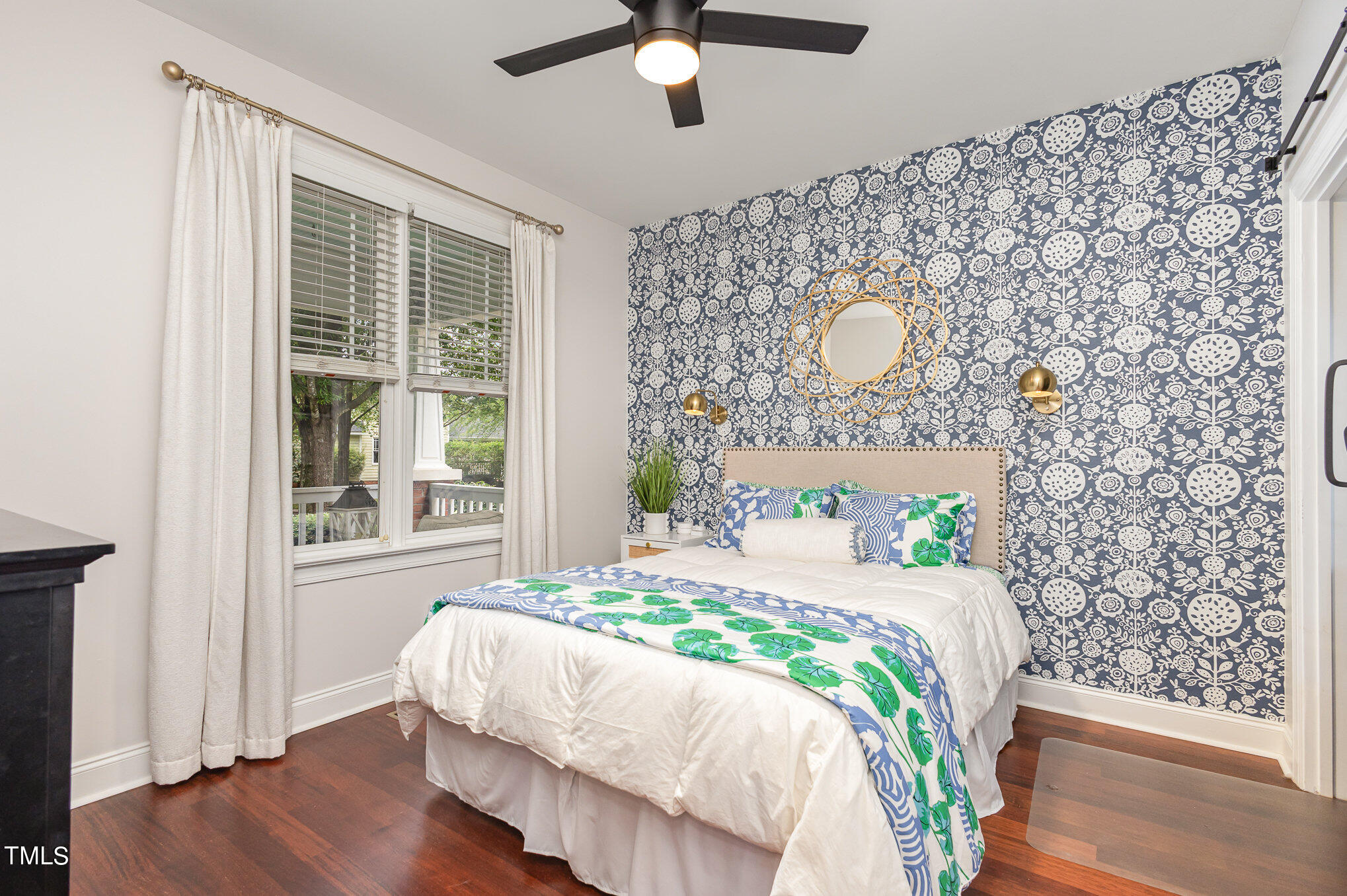 10534 Evergreen Spring Place Raleigh, NC 27614 - Photo 20 of 30 a bedroom with a bed and a window with wooden floor