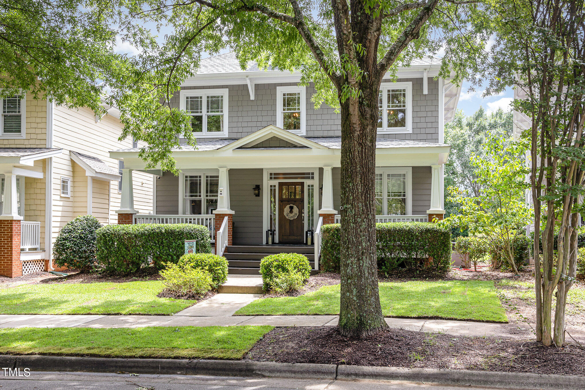 10534 Evergreen Spring Place Raleigh, NC 27614 - Photo 2 of 30 a front view of a house with garden