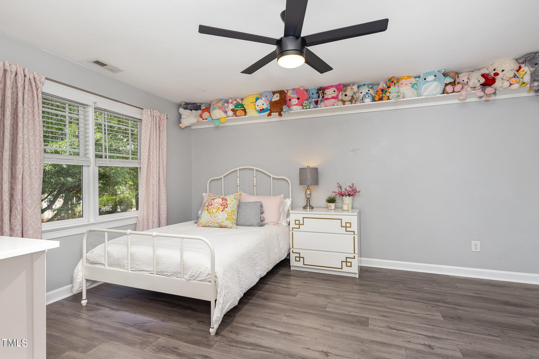 10534 Evergreen Spring Place Raleigh, NC 27614 - Photo 22 of 30 a bedroom with a bed and a window
