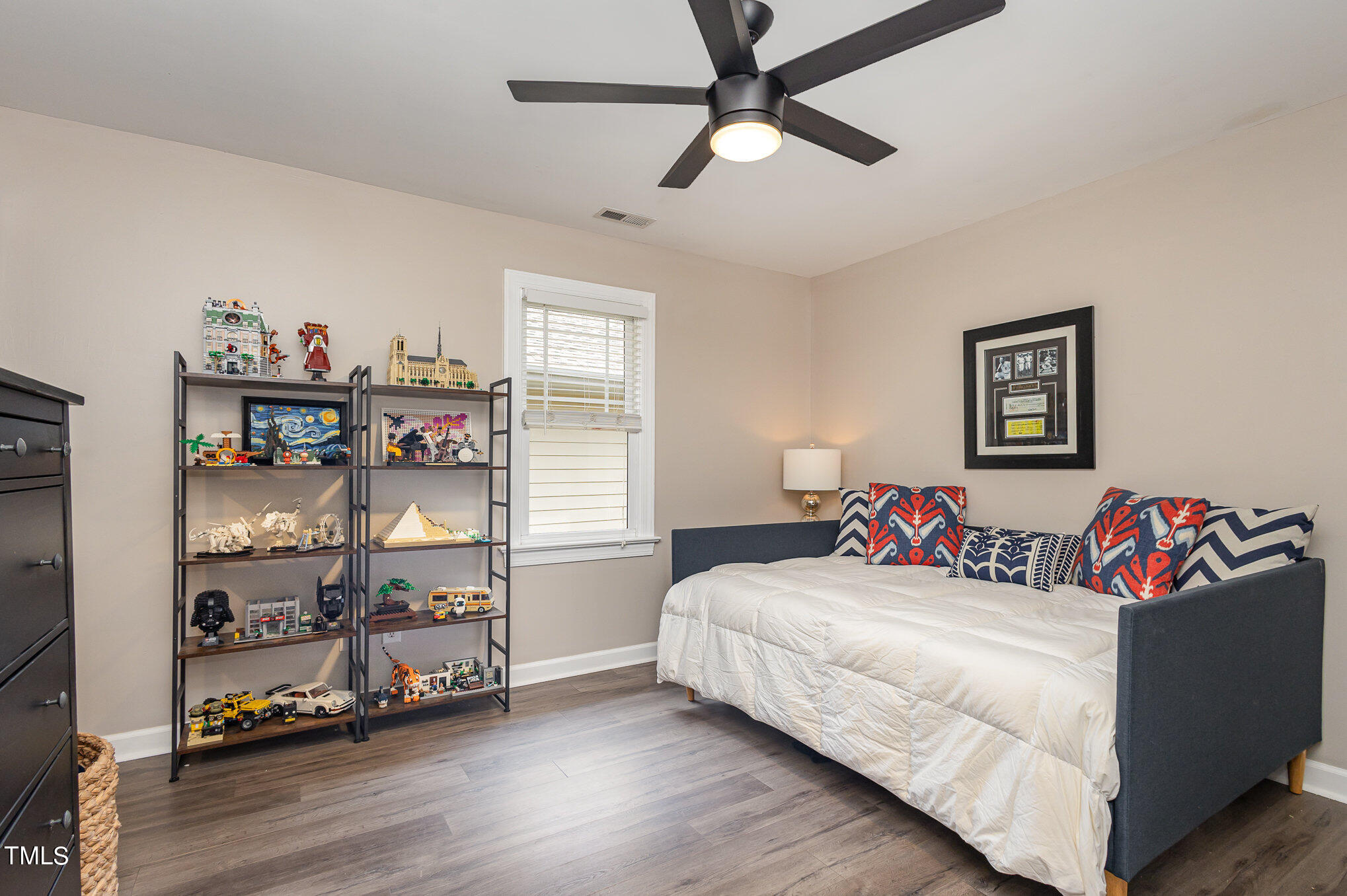 10534 Evergreen Spring Place Raleigh, NC 27614 - Photo 24 of 30 a bedroom with a bed and a window