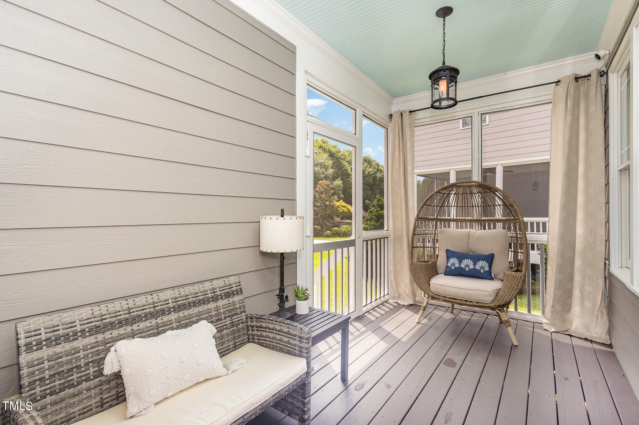 10534 Evergreen Spring Place Raleigh, NC 27614 - Photo 28 of 30 a living room with furniture and a table