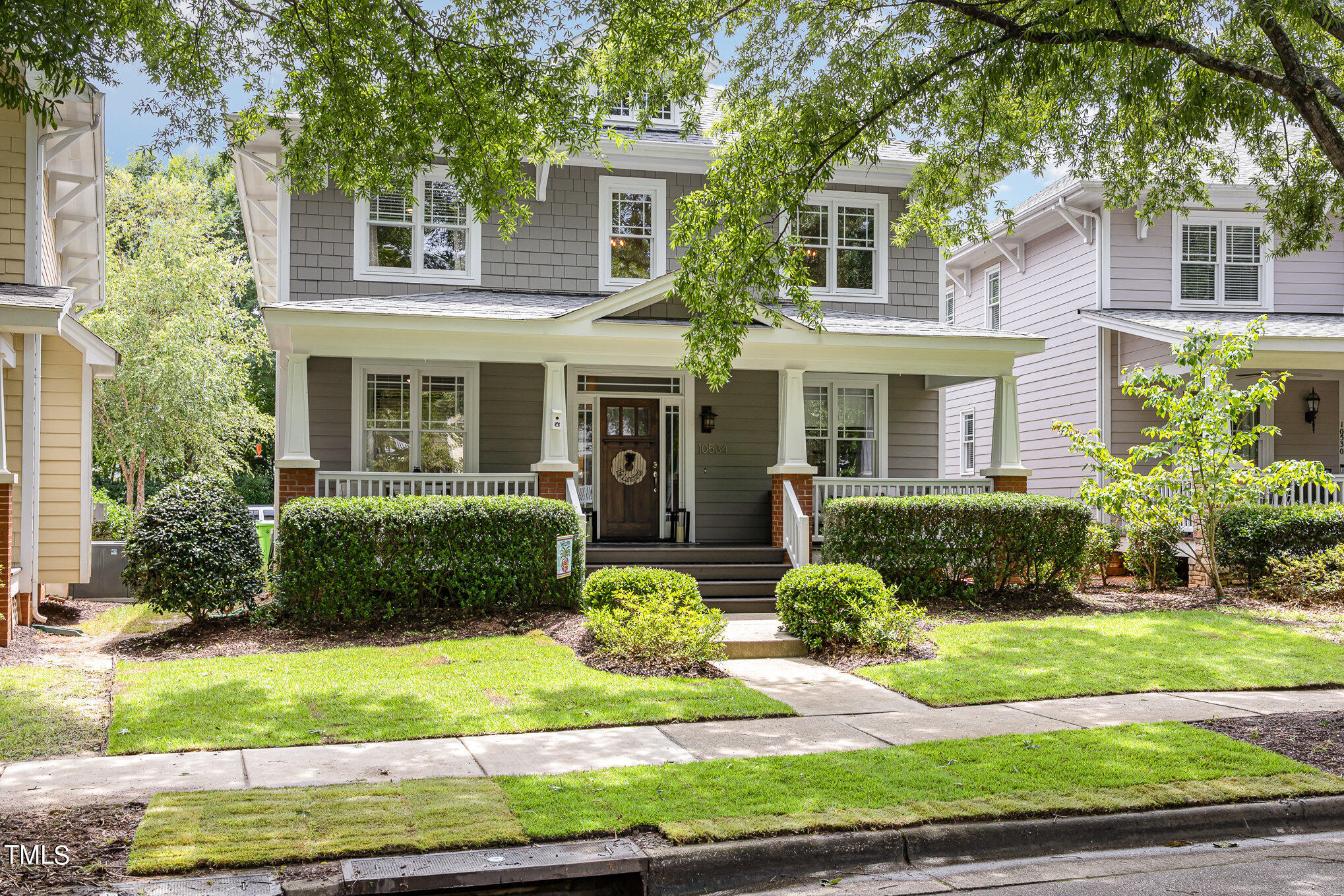 10534 Evergreen Spring Place Raleigh, NC 27614 - Photo 3 of 30 a front view of a house with a yard