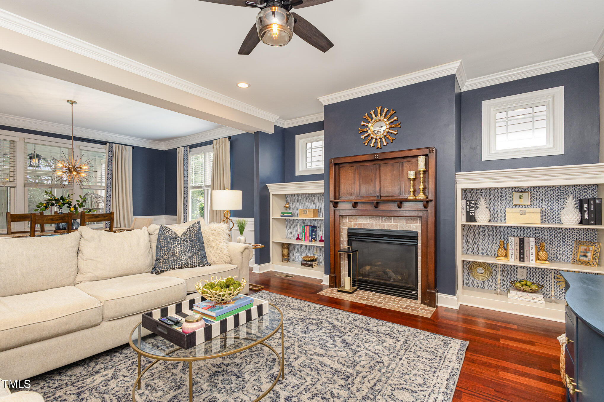 10534 Evergreen Spring Place Raleigh, NC 27614 - Photo 7 of 30 a living room with furniture and a fireplace