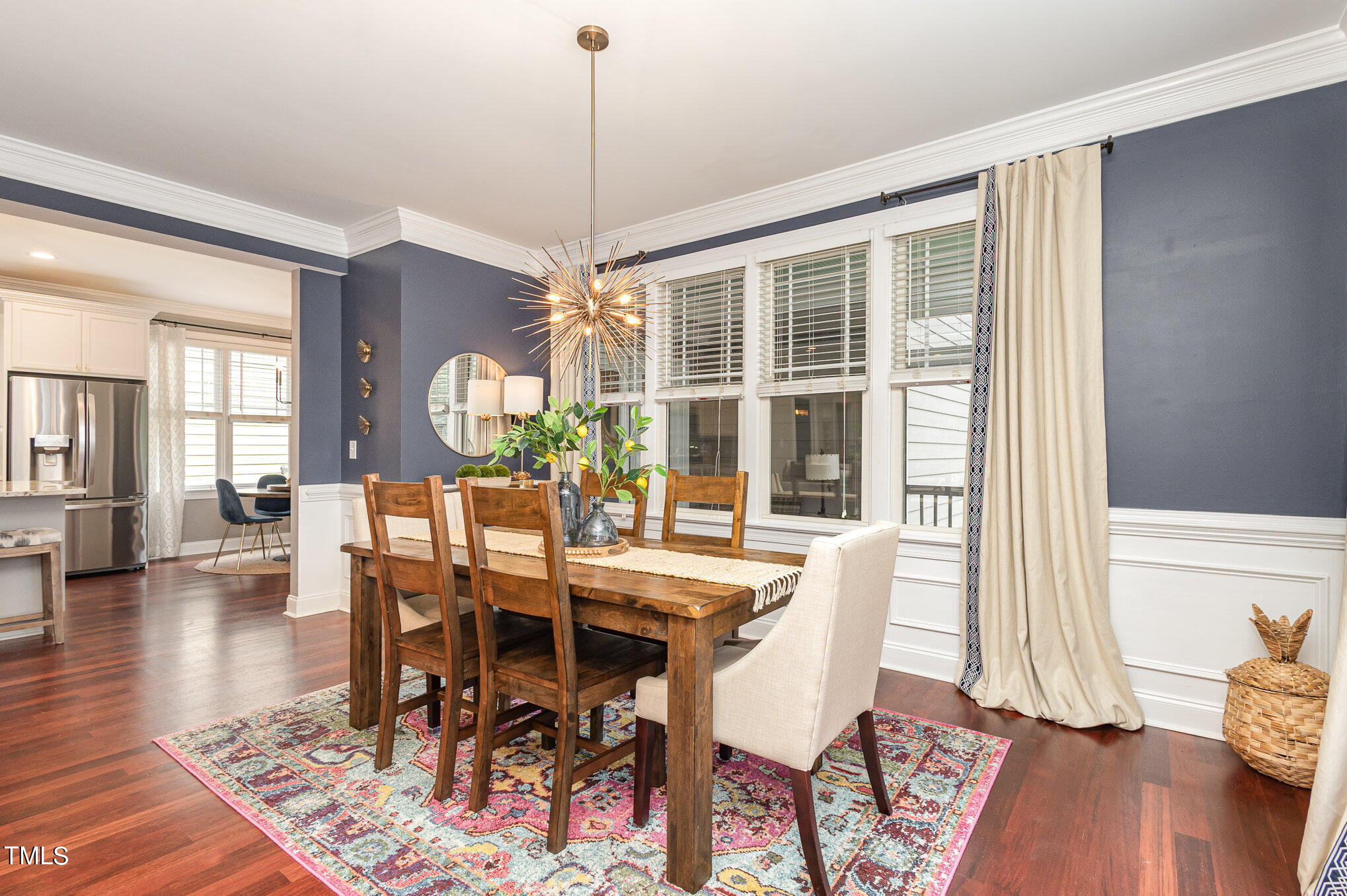 10534 Evergreen Spring Place Raleigh, NC 27614 - Photo 9 of 30 a view of a dining room with furniture window and wooden floor