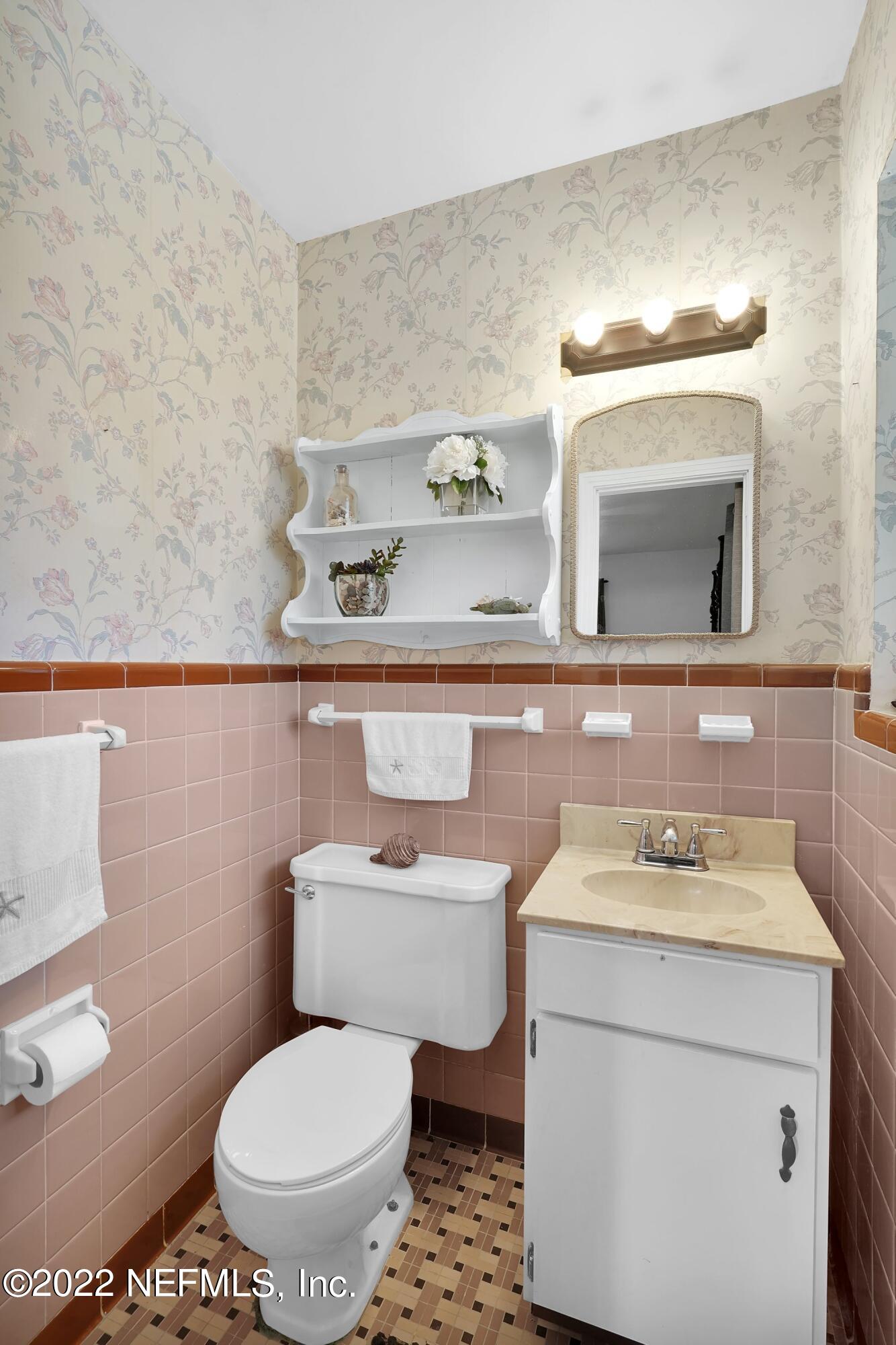 5329 Stanford Road Jacksonville, FL 32207 - Photo 15 of 28 a bathroom with a sink and a toilet