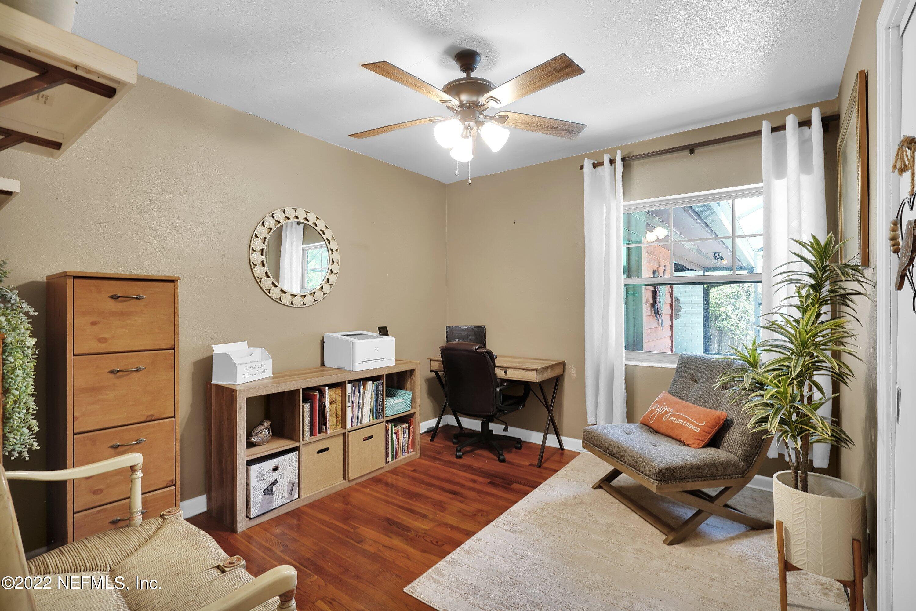 5329 Stanford Road Jacksonville, FL 32207 - Photo 16 of 28 a living room with furniture and a large window