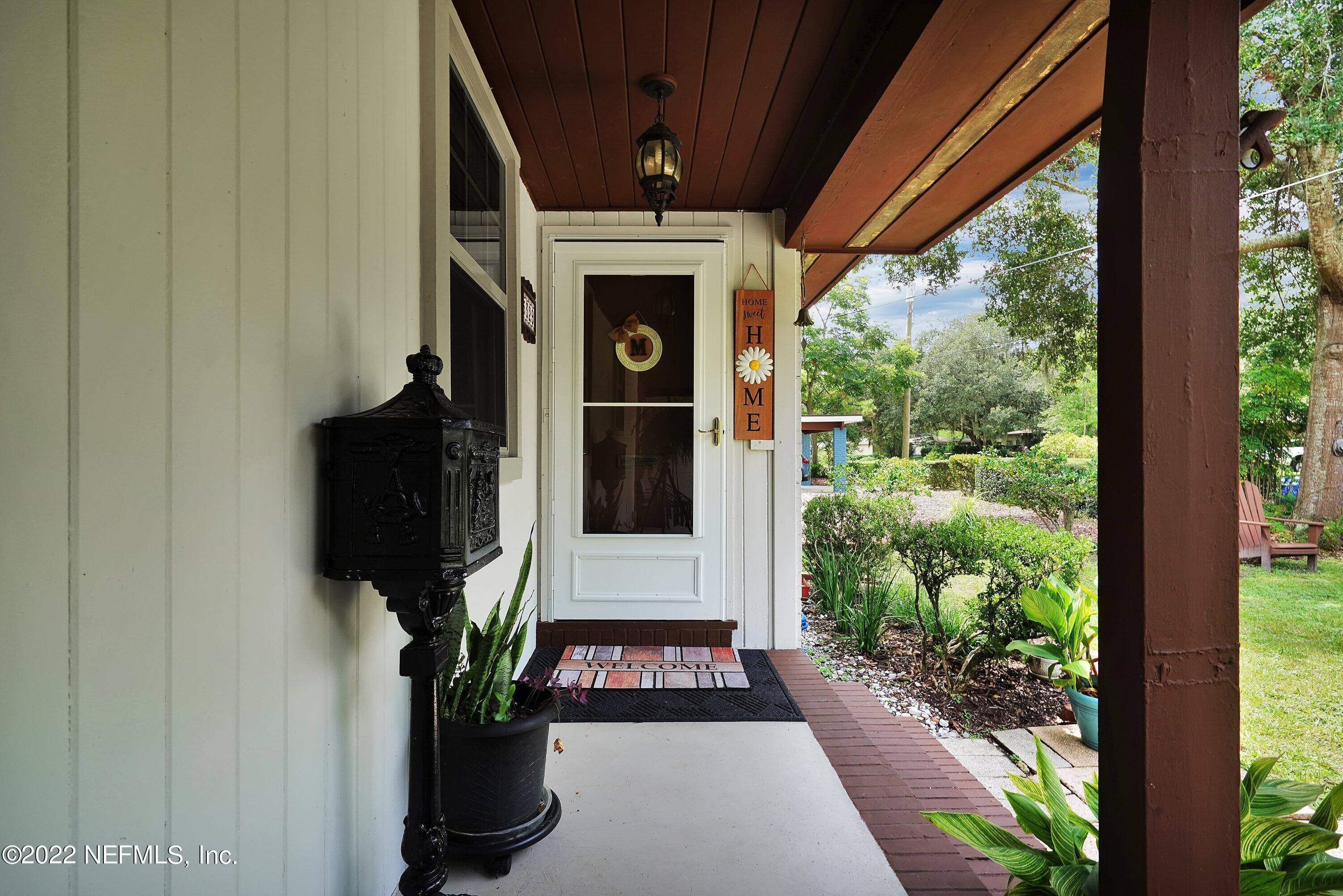 5329 Stanford Road Jacksonville, FL 32207 - Photo 6 of 28 a view of a porch with furniture