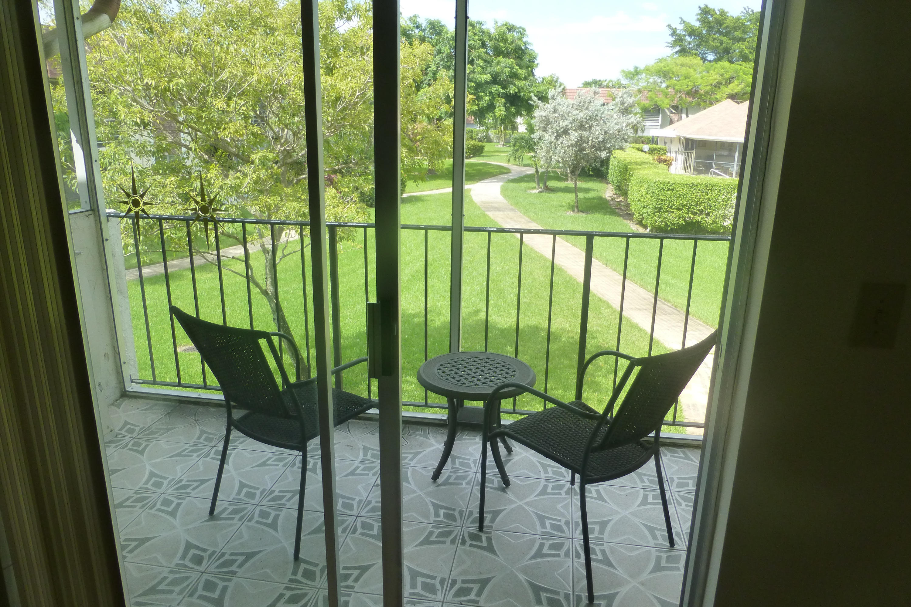 22785 Southwest 66th Avenue, Unit 208 Boca Raton, FL 33428 - Photo 3 of 15 Screened-in Balcony