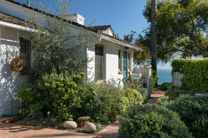 8316 Bates Road Ventura, CA 93001 - Photo 20 of 25 a backyard of a house with outdoor seating