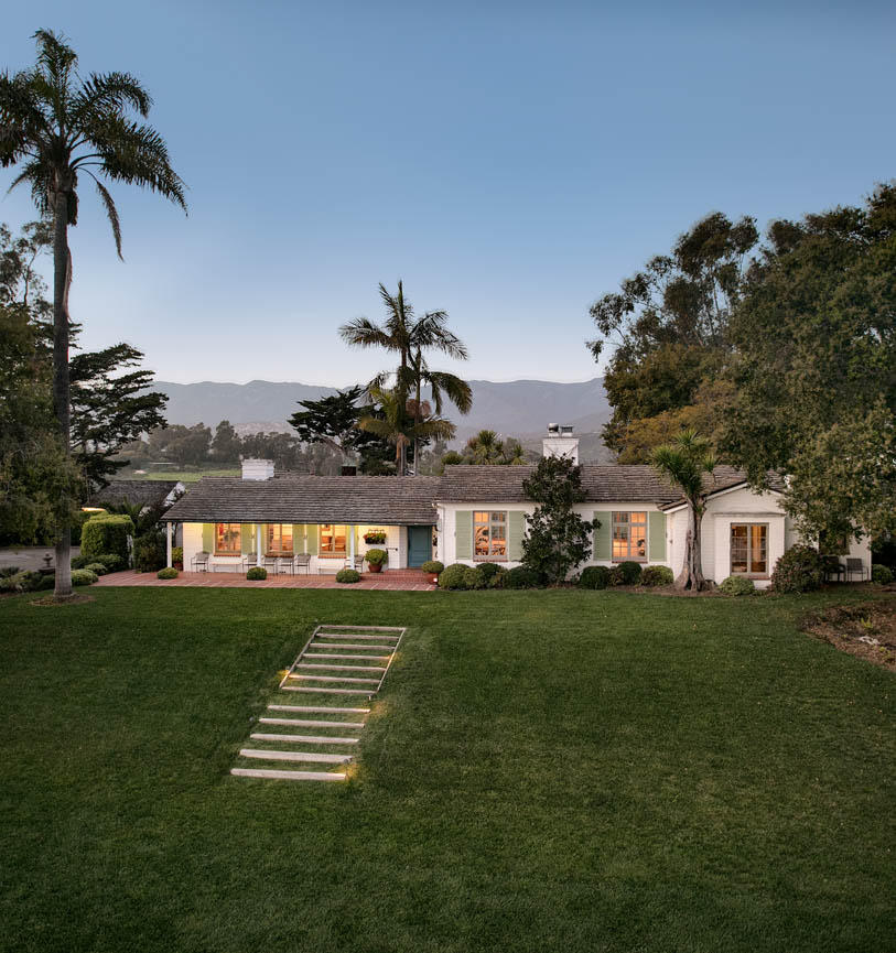 8316 Bates Road Ventura, CA 93001 - Photo 3 of 25 a front view of a house with a garden and yard