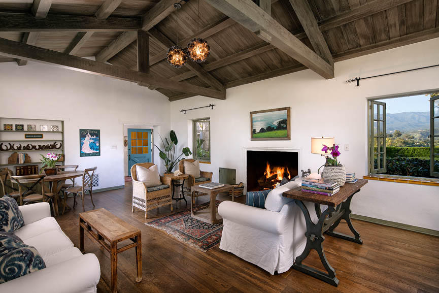 8316 Bates Road Ventura, CA 93001 - Photo 6 of 25 a living room with furniture a fireplace and a flat screen tv