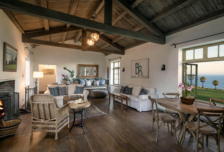 8316 Bates Road Ventura, CA 93001 - Photo 7 of 25 a living room with furniture wooden floor and a fireplace