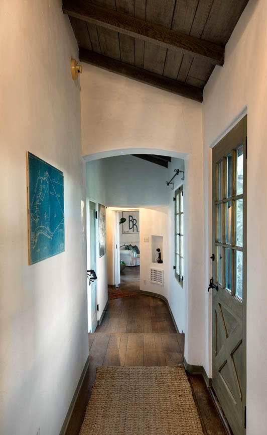 8316 Bates Road Ventura, CA 93001 - Photo 10 of 25 a view of a hallway view with wooden floor and staircase