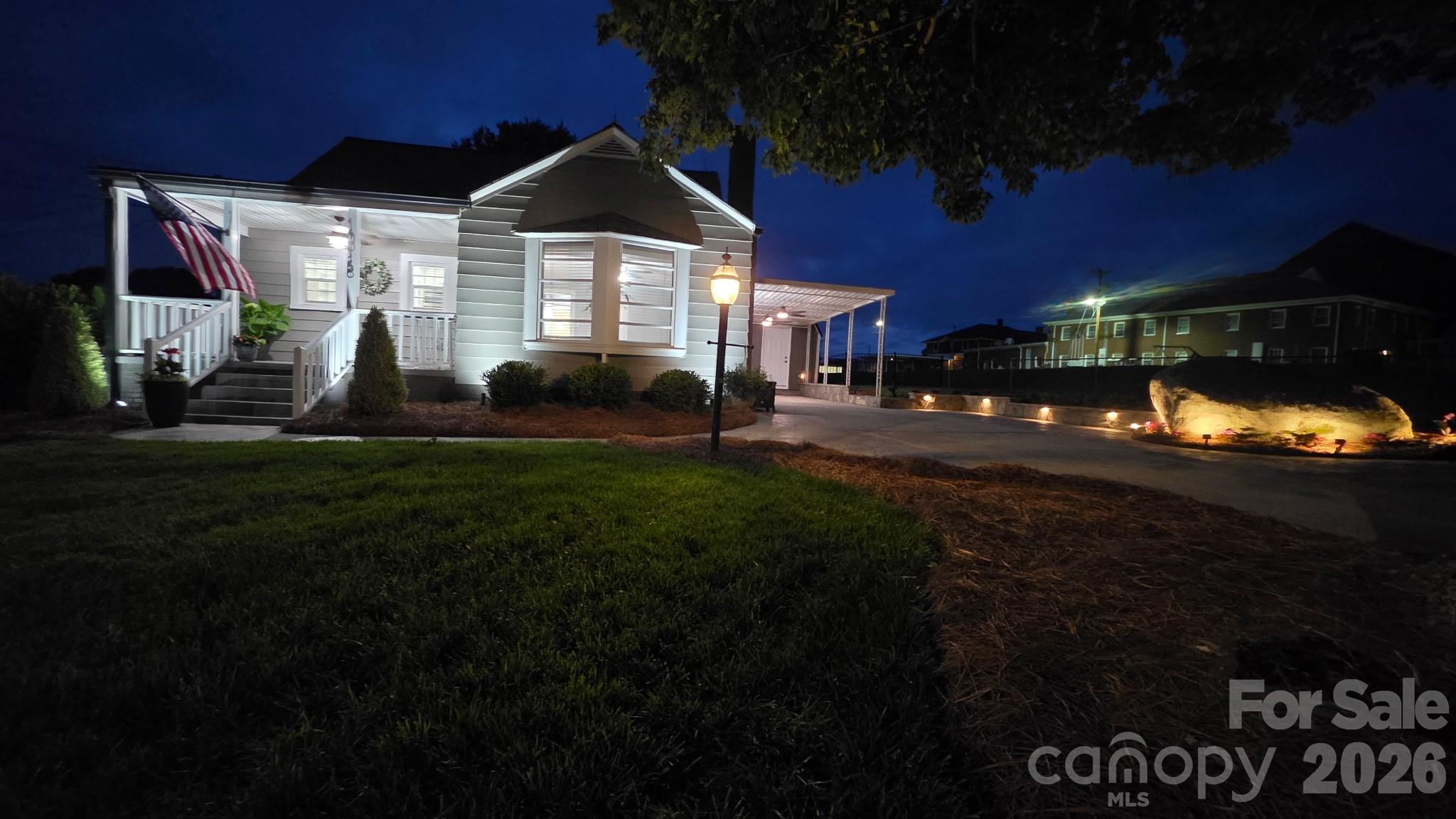 1016 Raney Street Salisbury, NC 28146 - Photo 41 of 45 a front view of a house with a yard
