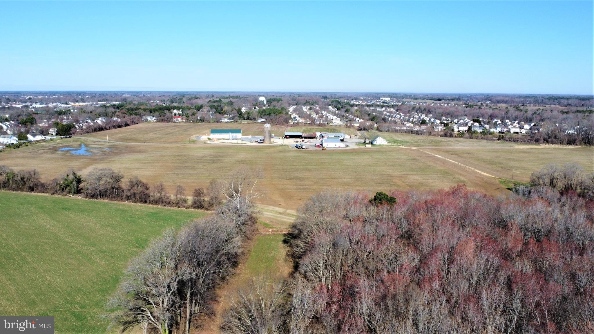 29587 Matthewstown Road Easton, MD 21601 - Photo 24 of 28 a view of a lake with houses