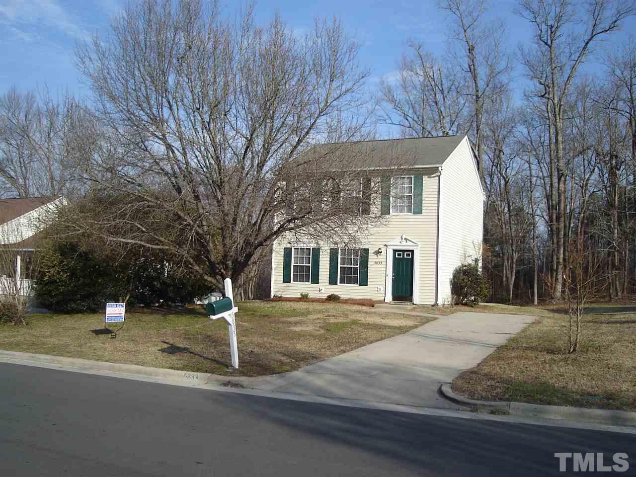 5833 Chatmoss Drive Raleigh, NC 27610 - Photo 2 of 10 a front view of a house with a yard