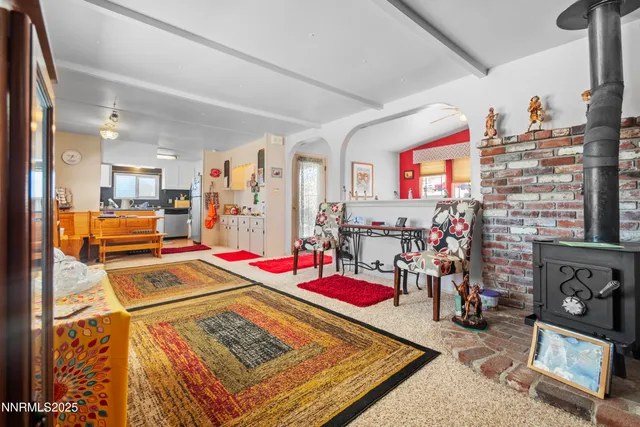 a room with lots of white furniture and appliances