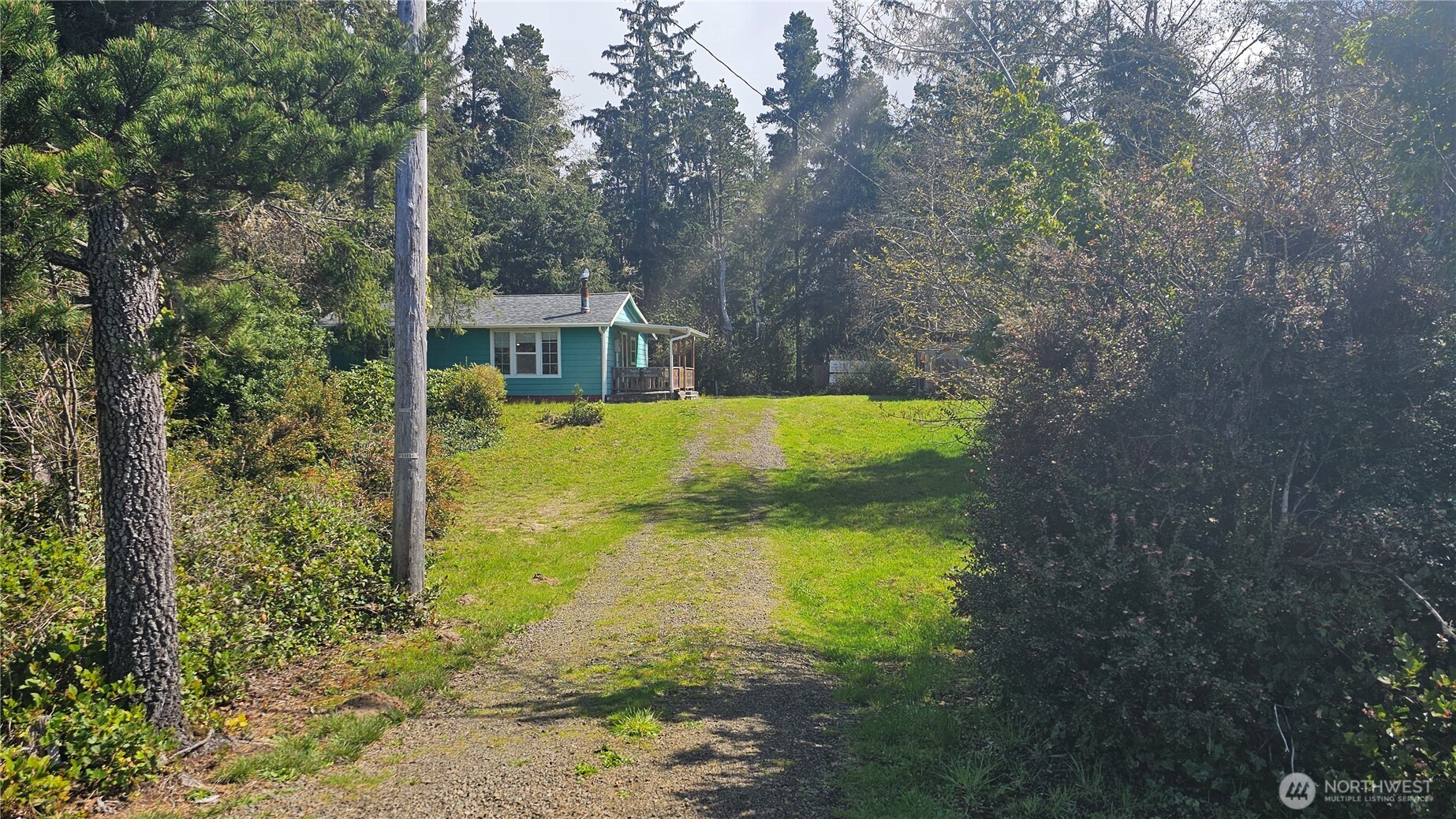 24402 P Street Ocean Park, WA 98640 - Photo 3 of 40 front view of a house with a yard