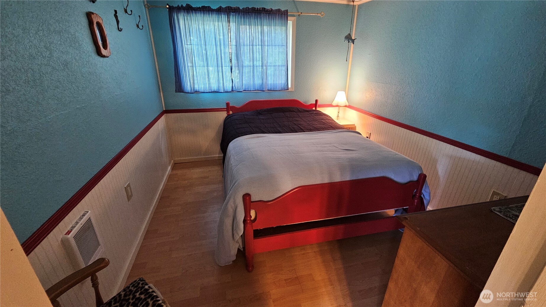 24402 P Street Ocean Park, WA 98640 - Photo 34 of 40 a bedroom with a bed and a window