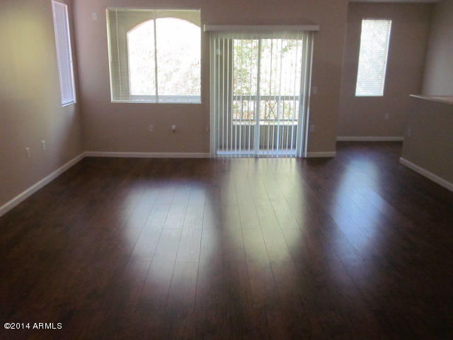 1920 East Bell Road, Unit 1037 Phoenix, AZ 85022 - Photo 7 of 24 LIVING ROOM, PERFECT FLOORING
