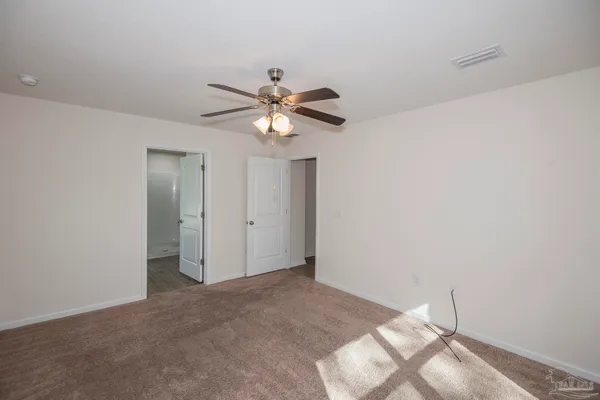 a bathroom with a granite countertop sink mirror and double