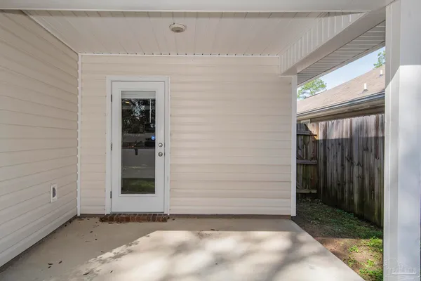 a view of a backyard with a small cabin