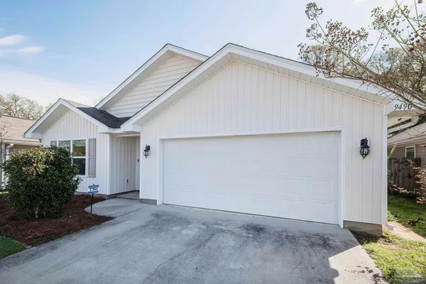 a view of backyard of house