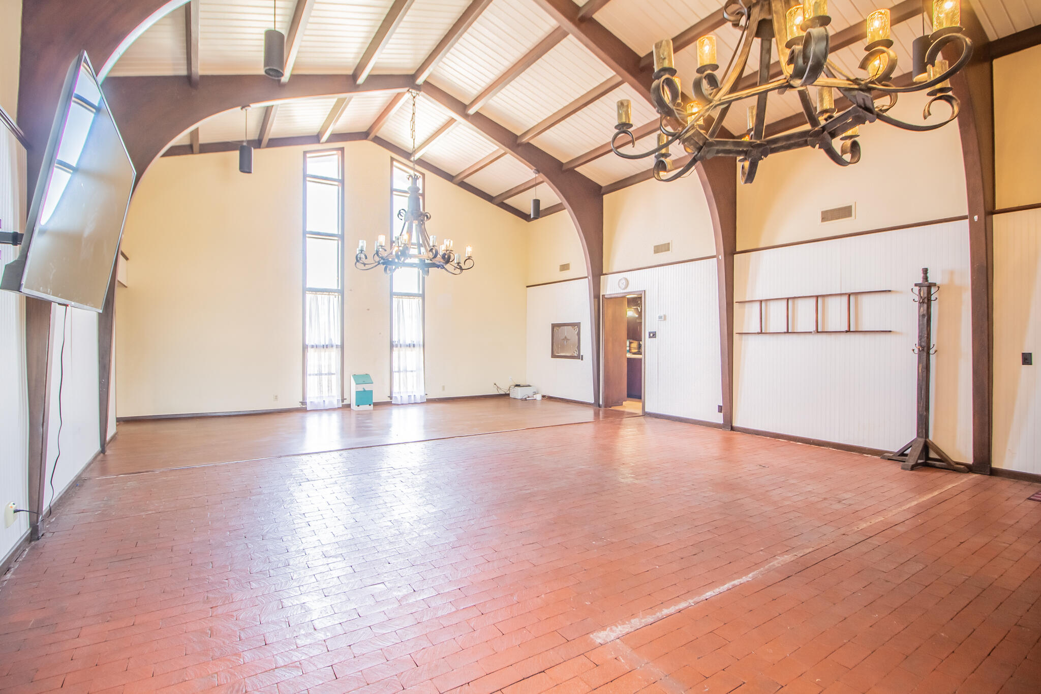 1181 Fm 2236 Ralls, TX 79357 - Photo 11 of 42 an empty room with wooden floor and door