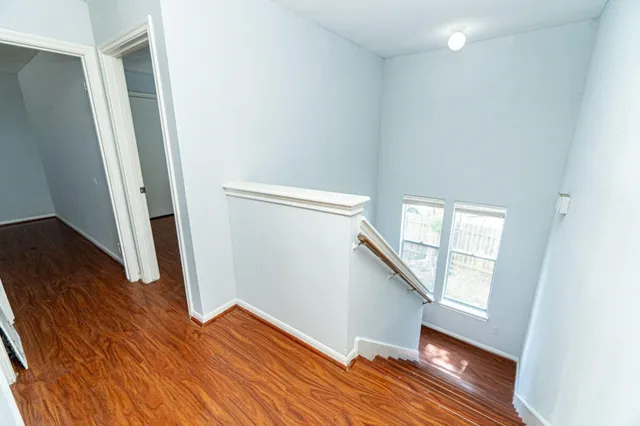 a view of entryway with wooden floor