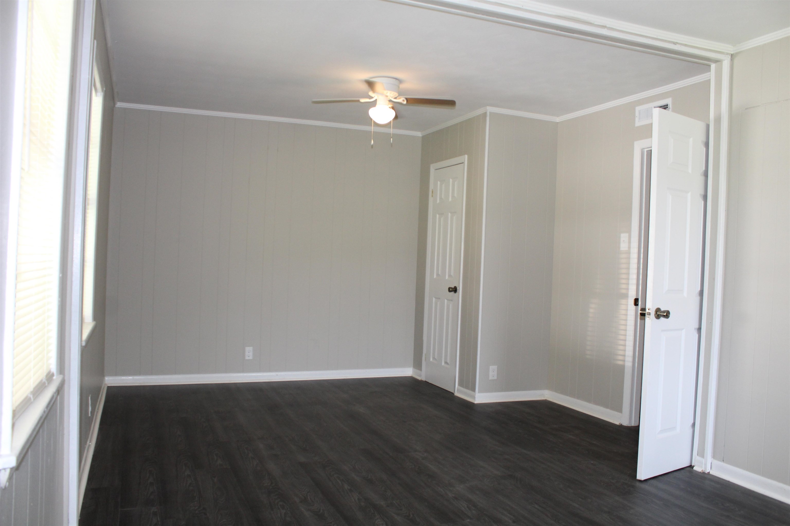 1367 Central Curve Road Ripley, TN 38063 - Photo 13 of 26 a view of an empty room with wooden floor