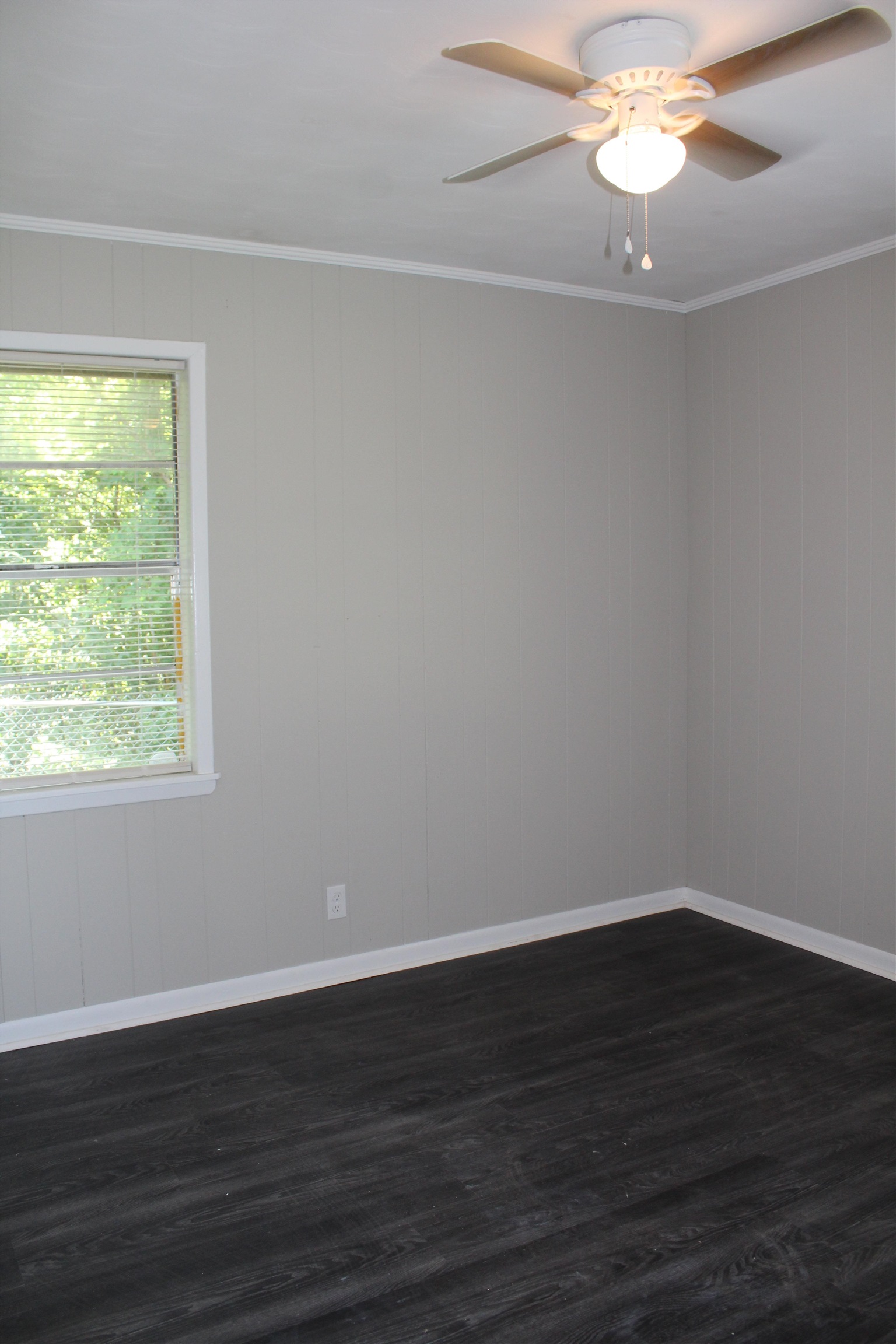 1367 Central Curve Road Ripley, TN 38063 - Photo 17 of 26 a view of a small space with wooden floor and windows