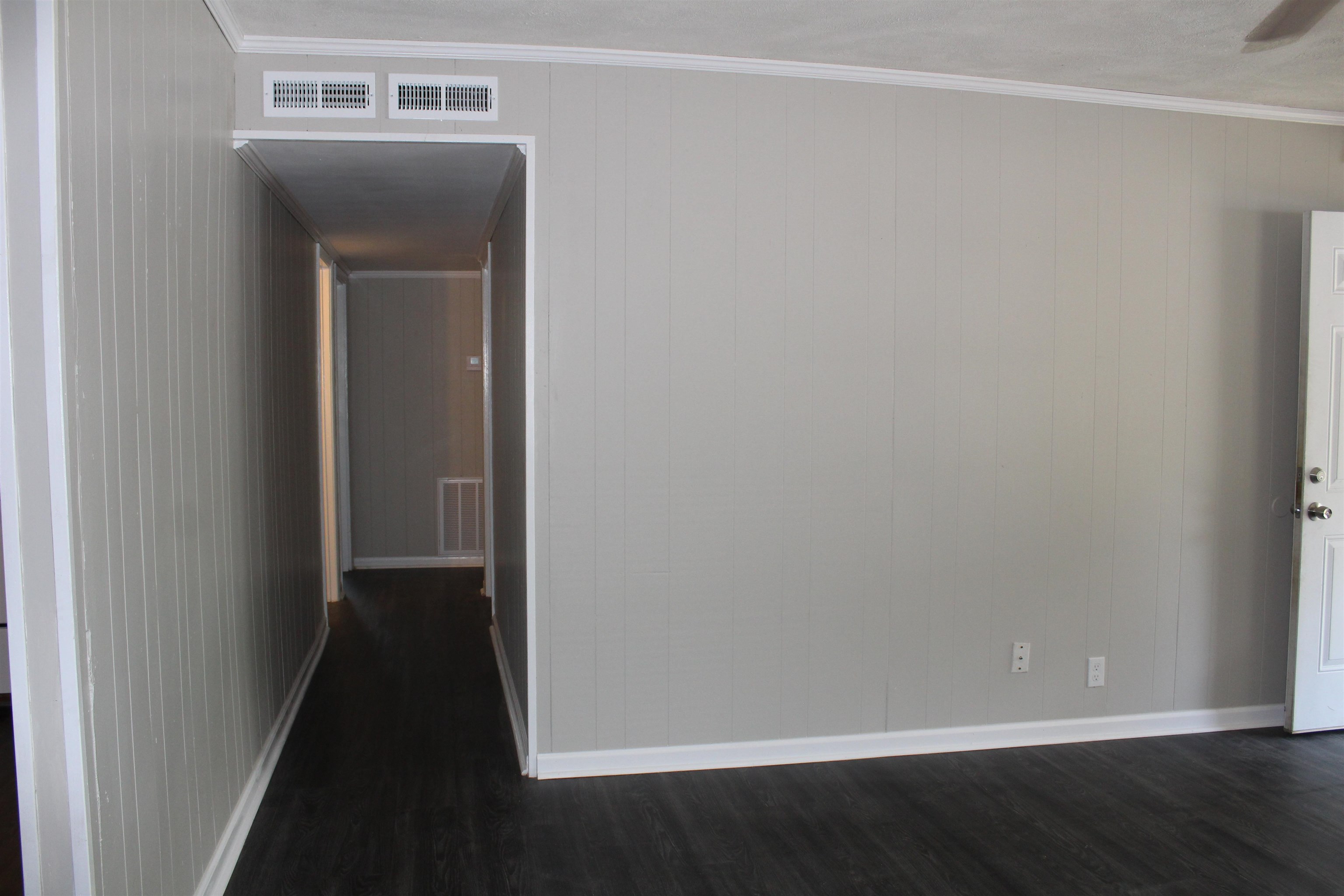 1367 Central Curve Road Ripley, TN 38063 - Photo 9 of 26 a view of a hallway with wooden floor