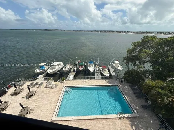 a view of a lake with couches