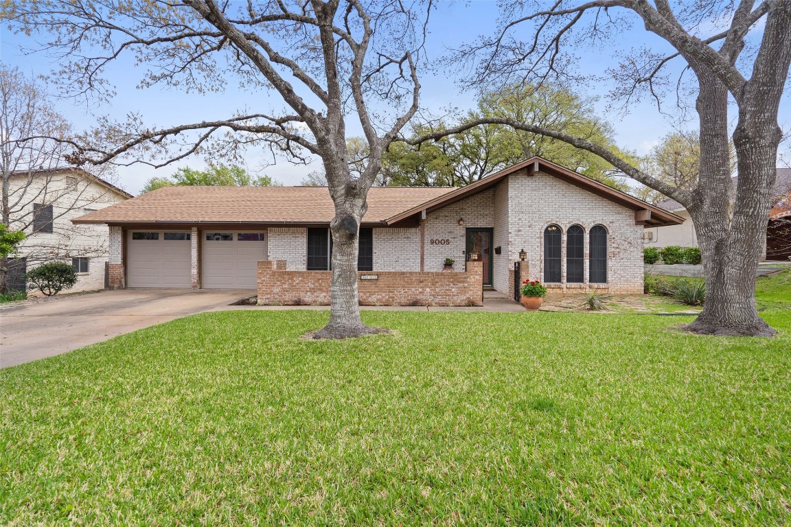Lovely ranch style home with 4 sides brick and recent roof