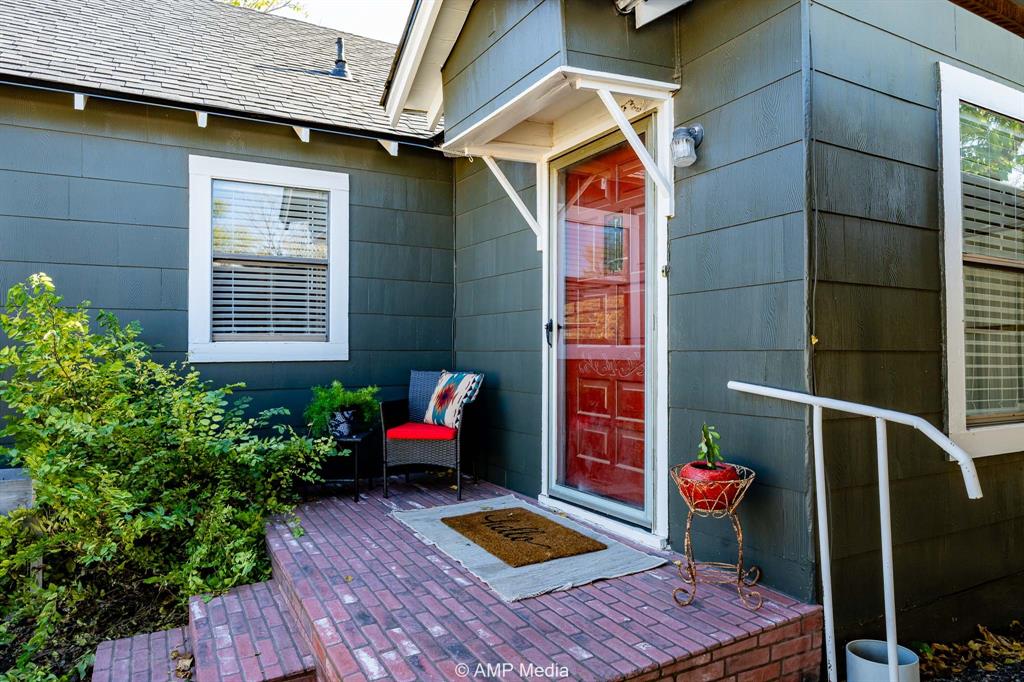 1002 Maple Street Stamford, TX 79553 - Photo 24 of 40 a front view of a house with outdoor space