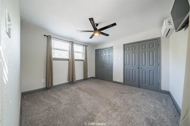 a view of empty room with windows