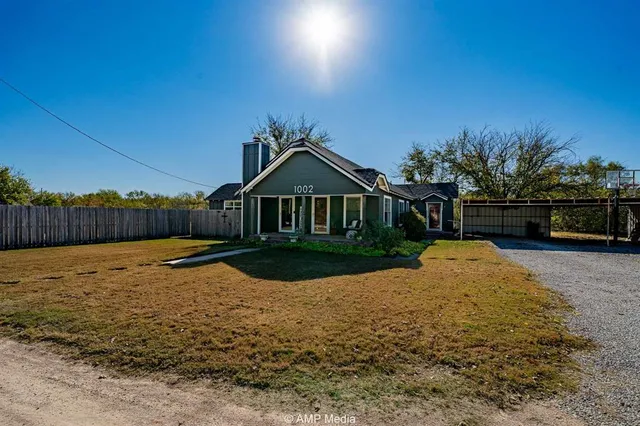 a swimming pool with wooden fence