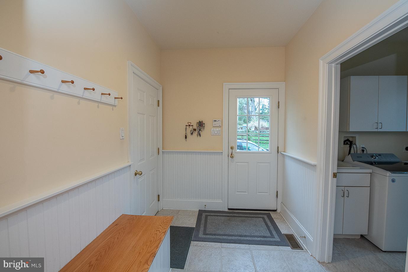 125 South Valley Road Paoli, PA 19301 - Photo 31 of 78 Efficient mudroom exits to garage and driveway.