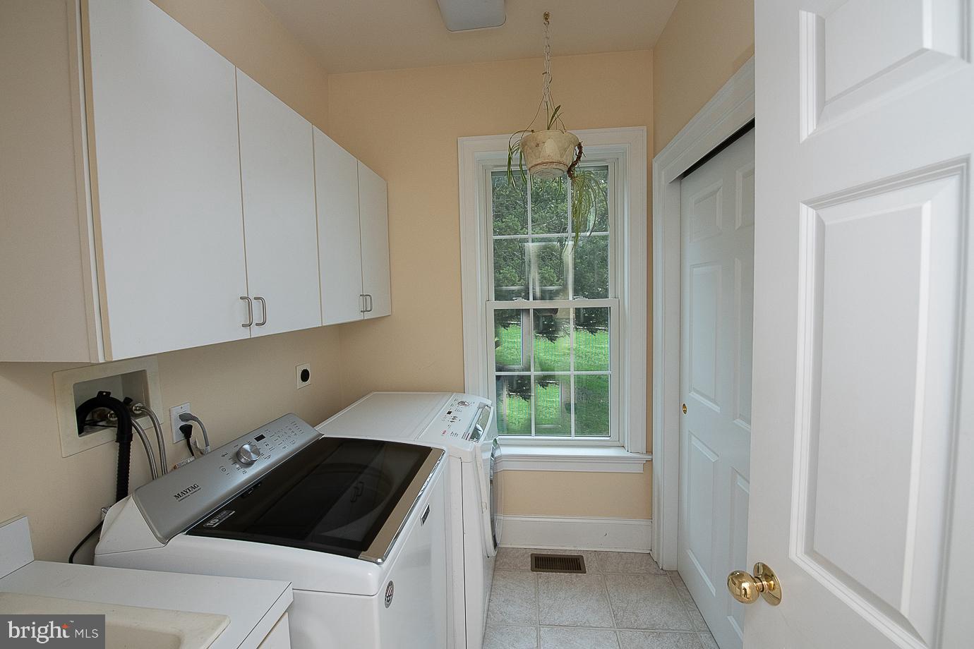 125 South Valley Road Paoli, PA 19301 - Photo 32 of 78 Spacious laundry room with ample storage.