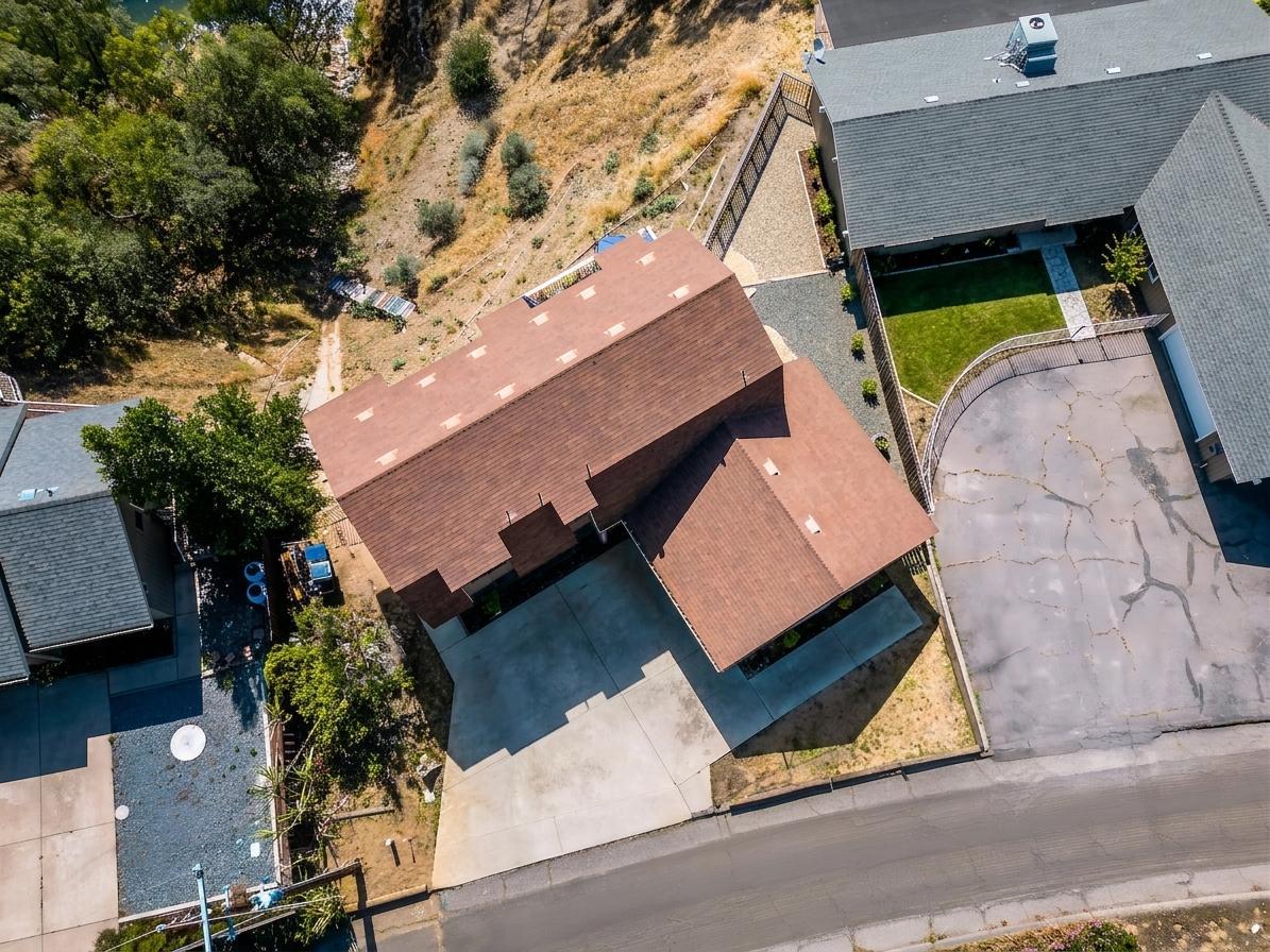 27817 Sky Harbour Road Friant, CA 93626 - Photo 32 of 36 an aerial view of a house with a garden