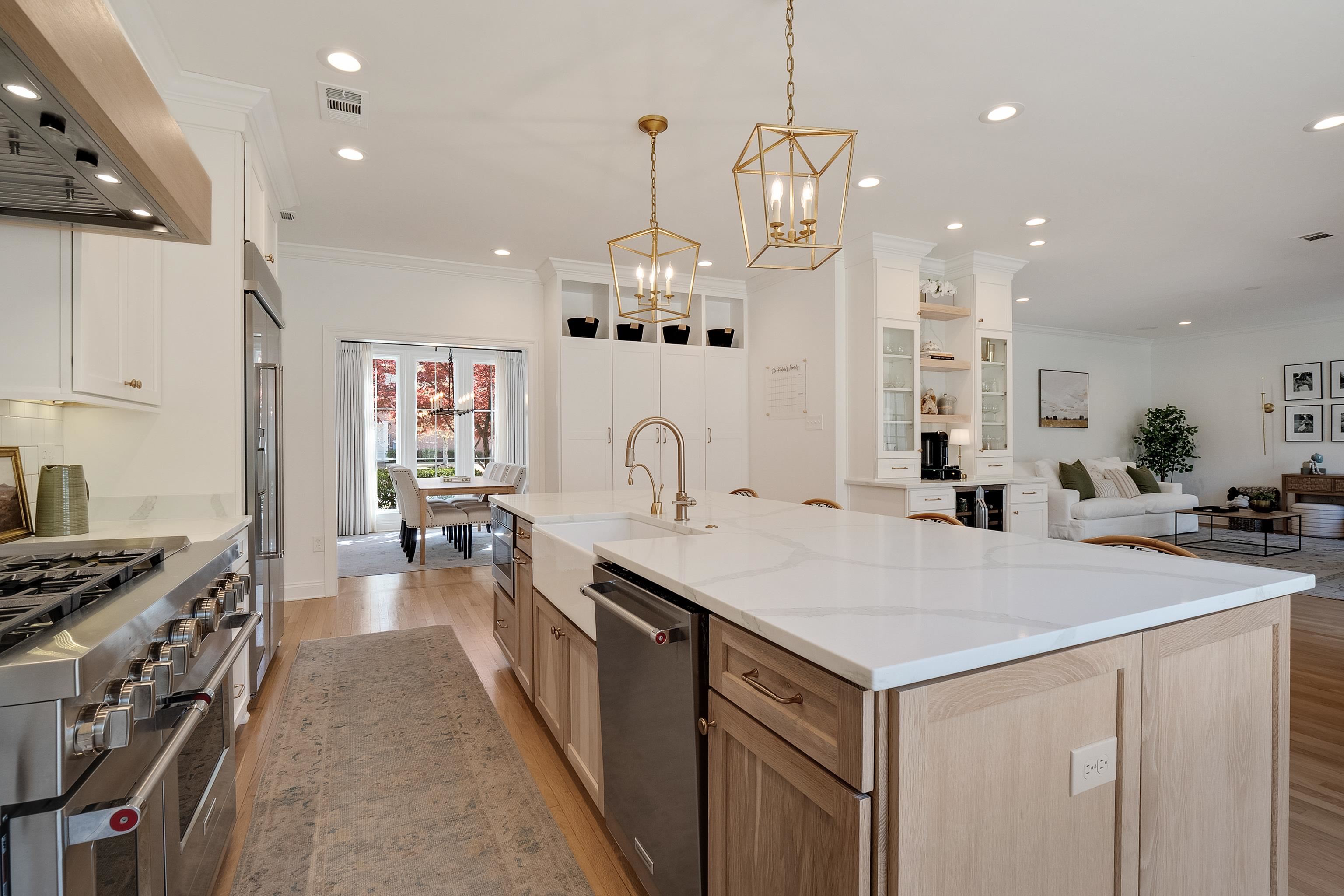 1870 Lonhill Drive Collierville, TN 38017 - Photo 12 of 34 a kitchen with a sink a stove and a refrigerator