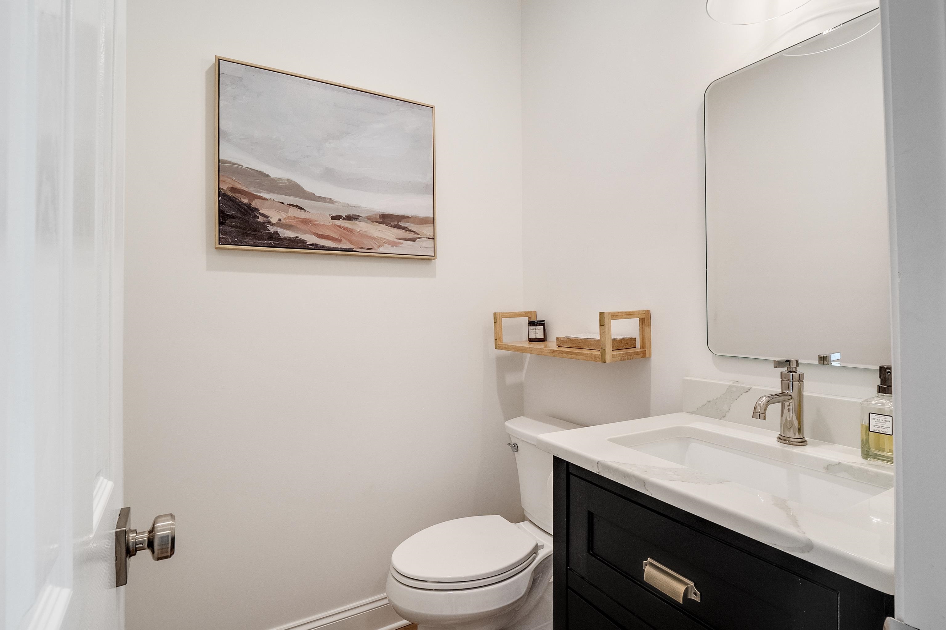 1870 Lonhill Drive Collierville, TN 38017 - Photo 15 of 34 a bathroom with a granite countertop sink mirror vanity and toilet