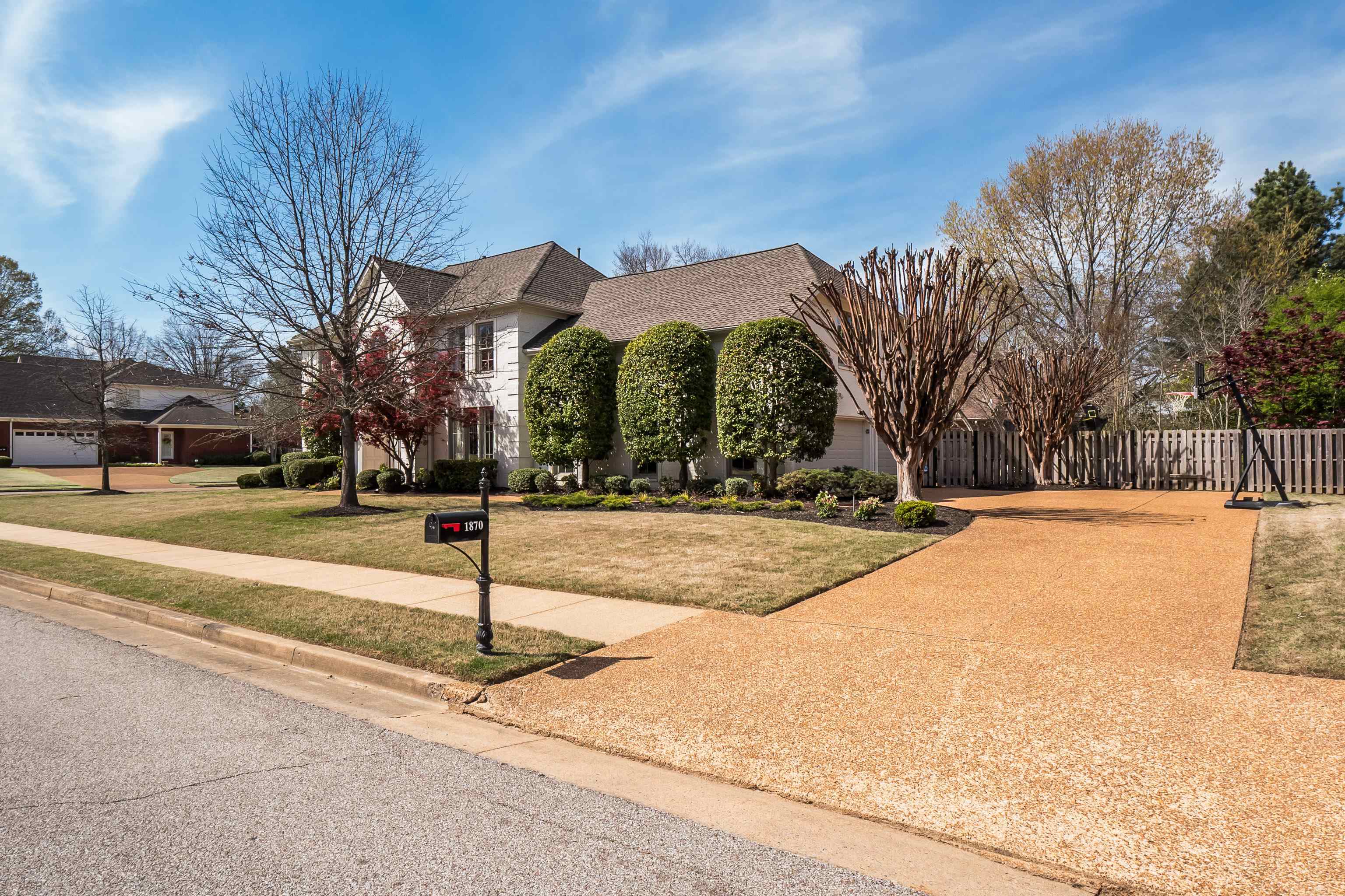 1870 Lonhill Drive Collierville, TN 38017 - Photo 2 of 34 a view of white house with a yard