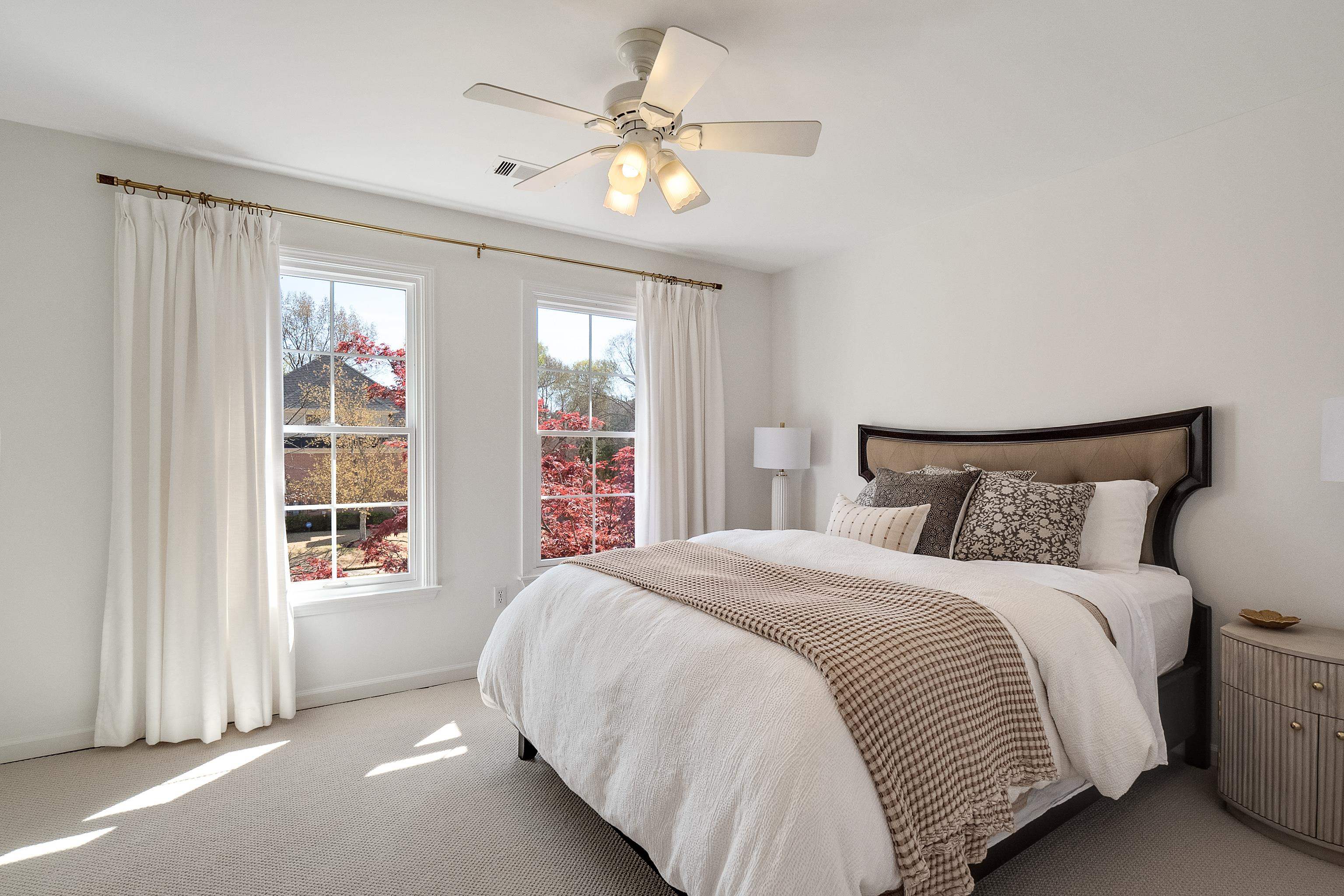 1870 Lonhill Drive Collierville, TN 38017 - Photo 24 of 34 a bedroom with a large bed and a window